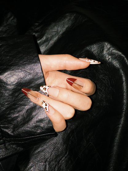 Miss Rouge press-on nails — red with leopard spots, long almond shape | Ochic